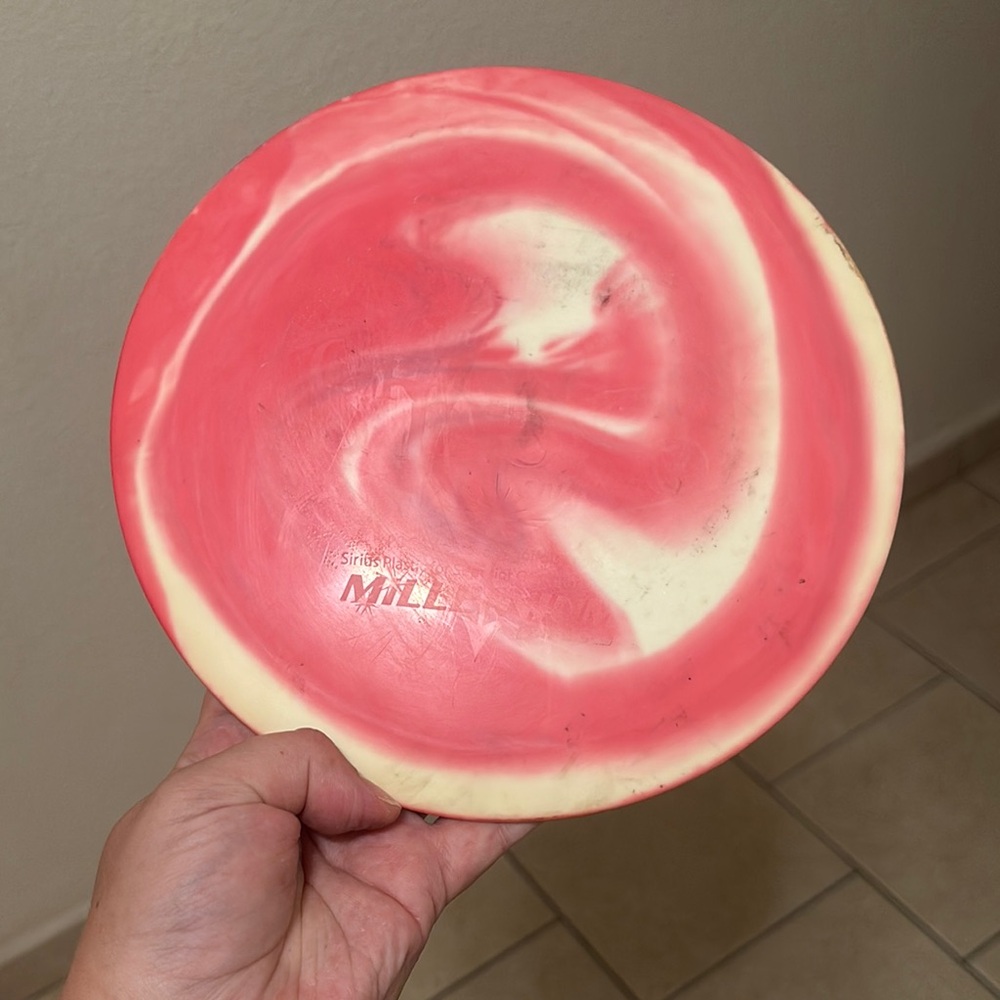 Pink and Cream Disc Golf Disc millennium